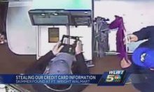 Footage of crooks installing the card skimmers at a Walmart self-checkout terminal. Source: WLWT.